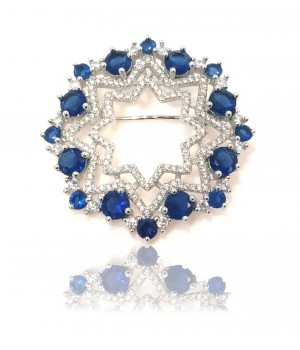 Silver star brooch with...